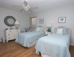 The second bedroom features two twins, perfect for kids or teens